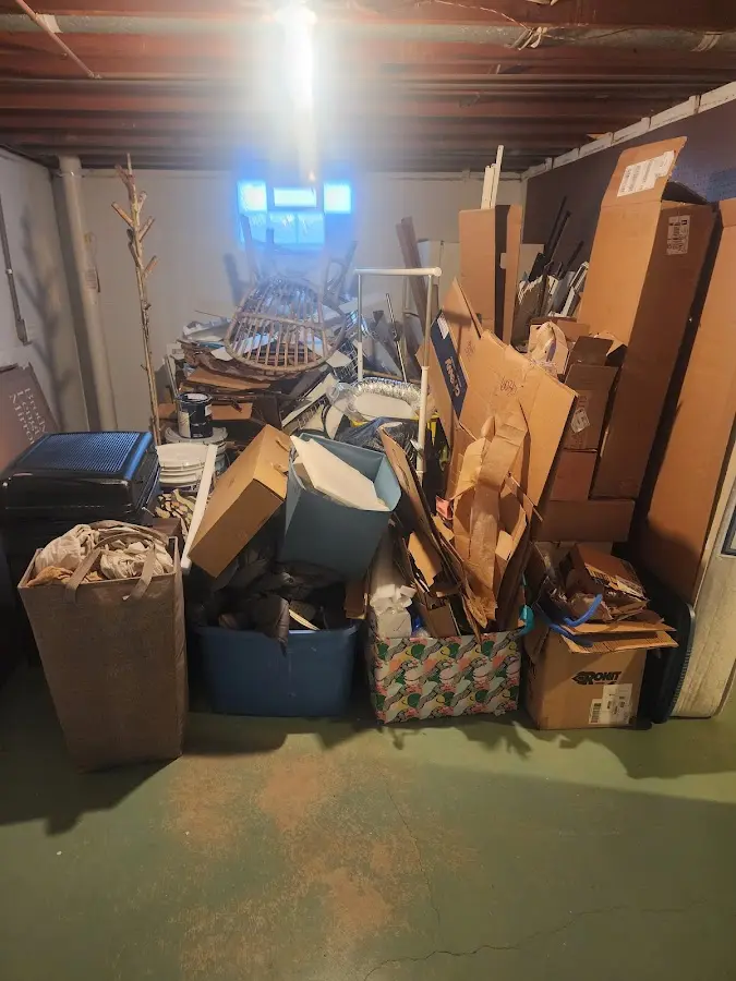 Roll-off dumpster container at job site for Construction Dumpster Rental in Poplar Grove